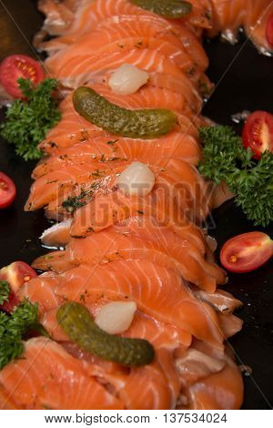 Closeup on slice of smoked salmon background