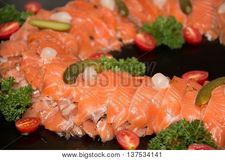 Closeup on slice of smoked salmon background