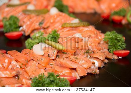 Closeup on slice of smoked salmon background