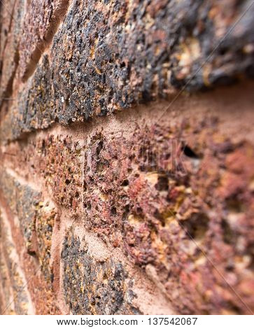 A texture wall background,Stone walls, dark look from the side.