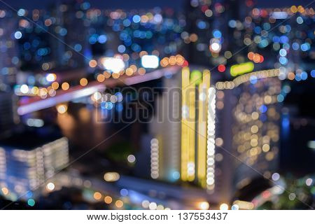 Defocused or blurry bokeh of city at night from top angle view
