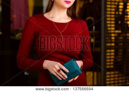 handsome woman holding wallet. Shopping center shopping go shopping.