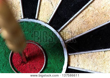Dartboard With Steeldarts In Bullseye