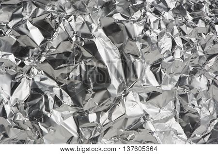 Crumpled aluminum metal foil as a background