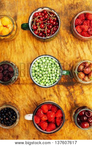 Colorful Mix Of Fruits On Black Background. View From Above. Fresh Organic Berries ,  So You Can Eat