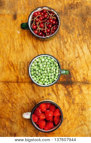 Colorful Mix Of Fruits On Black Background. View From Above. Fresh Organic Berries ,  So You Can Eat