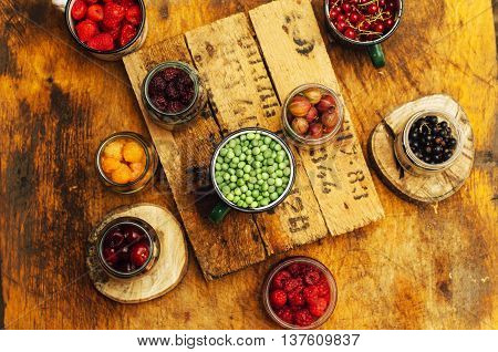 Colorful Mix Of Fruits On Black Background. View From Above. Fresh Organic Berries ,  So You Can Eat