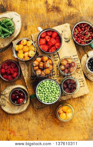 Colorful Mix Of Fruits On Black Background. View From Above. Fresh Organic Berries ,  So You Can Eat