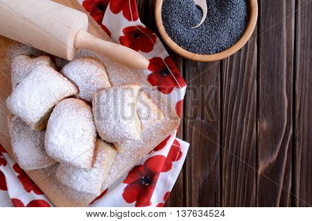 Baked yeast dumpling with poppy seed filling