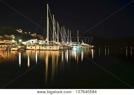 night photography of sailboats at Ithaca port Ionian islands Greece