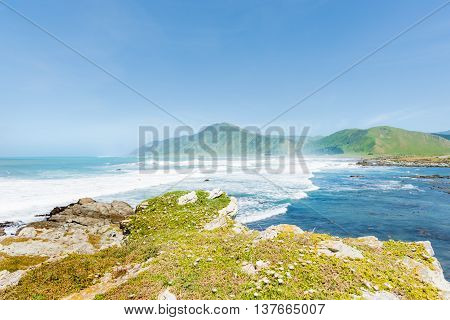 Coastal New Zealand long view land and sea Manurewa Point Wairarapa.