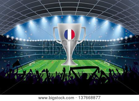 Trophy With France Flag And Excited Crowd Of People At A Soccer Stadium.