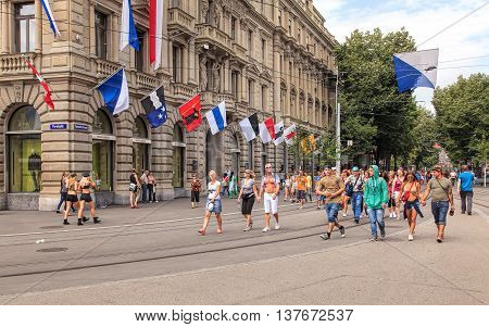 Zurich, Switzerland - 2 August, 2014: Bahnhofstrasse street short before the start of the Street Parade. The Street Parade is the most attended technoparade in Europe it takes place in the city of Zurich, Switzerland.