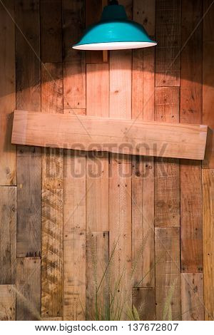 vertical wall background worm lamp on top emptry sign wood