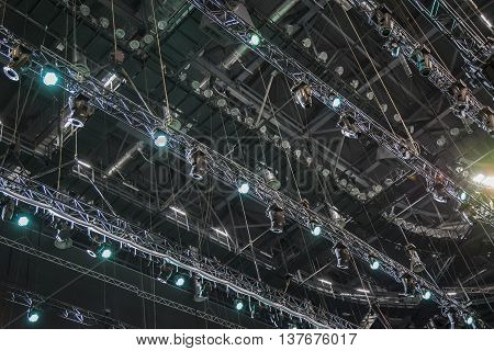 Extensive scaffolding providing platforms lighting devices for stage structure support