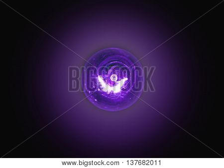 Light Bulb Lit On A Black Background