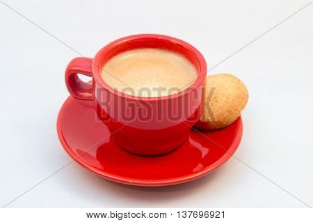 Red Coffee Cup And Saucer With Coffee And Biscuit