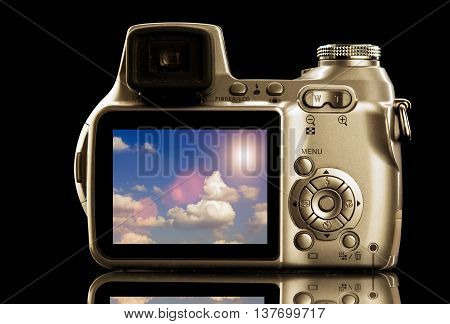 Isolated Photo Video Camera With Cloudscape On Display
