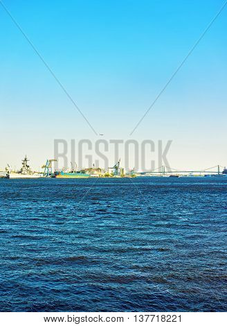Ships near Benjamin Franklin bridge over Delaware River in Philadelphia Pennsylvania the USA.