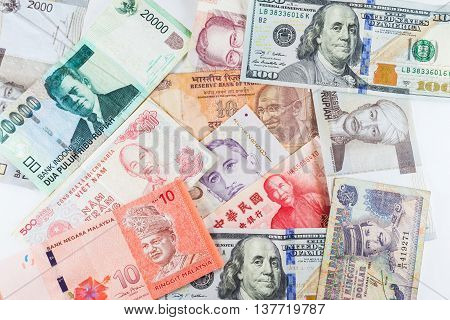 Multiple Currencies banknotes as colorful background showed the global money financial business economy crisis
