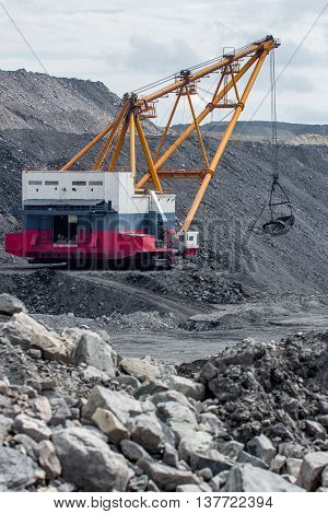 Dragline on open pit coal mine in Russia