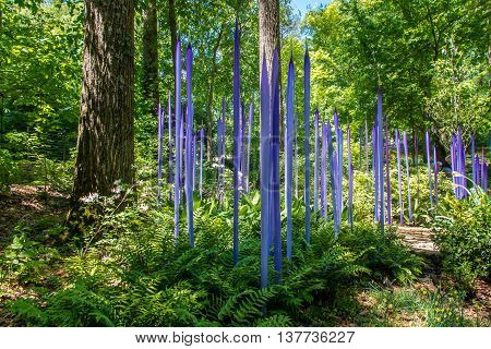 ATLANTA GA USA - APRIL 23 2016: Exhibition of glass artist Chihuly takes place in the Atlanta Botanical Garden in Atlanta Georgia in 2016.