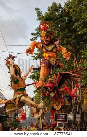 KUTA INDONESIA - MARCH 08: Ogoh-ogoh statues at the parade on the eve of Nyepi day on March 08 2016 in Kuta Bali Indonesia