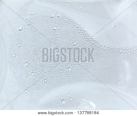 Many water drop on the free shape glass.