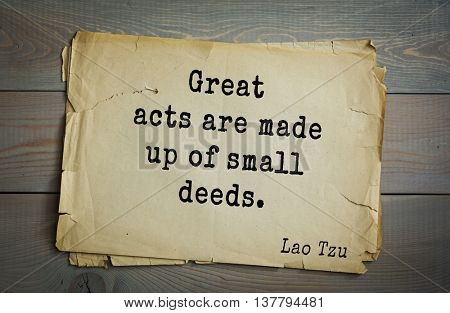 Ancient chinese philosopher Lao Tzu quote on old paper background. Great acts are made up of small deeds.