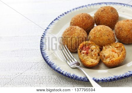 arancini di riso, fried risotto rice balls, italian sicilian food