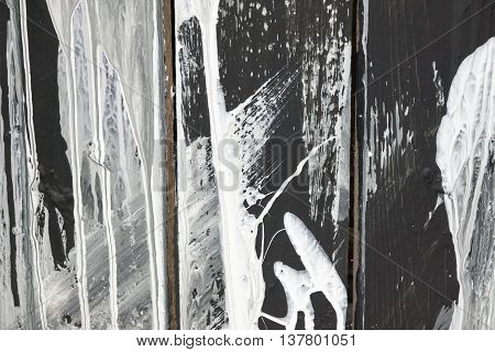 the spotty textured and indistinct abstract black white background