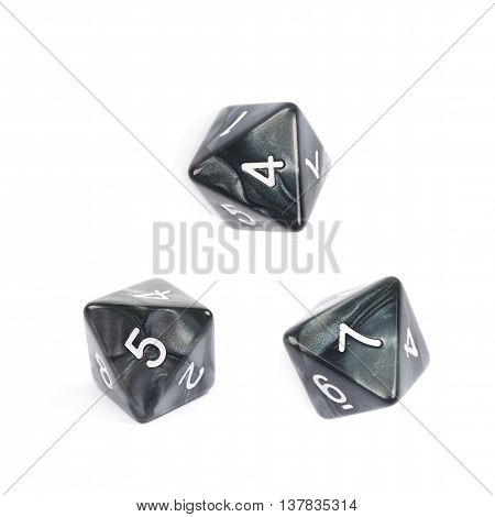 Roleplaying black polyhedral octahedron gaming plastic dice isolated over the white background, set of three different foreshortenings