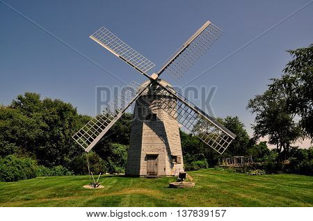 Middletown Rhode Island - July 16 2015: 1812 Robert Sherman shingled smock windmill at the Prescott Farm historic site