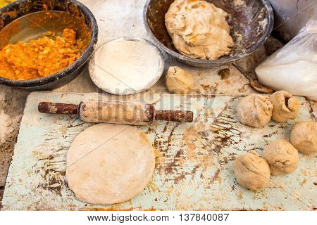 Traditional way of making indian parantha on street sell stall in Jaisalmer, India