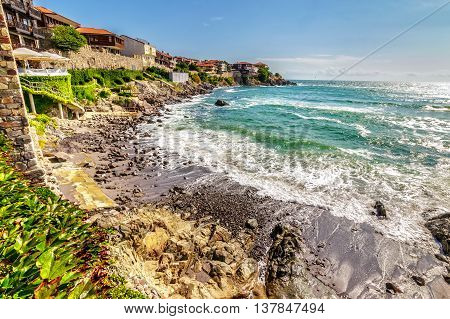 SOZOPOL - AUGUST 9: Old City beach on August 9 2015 in Sozopol Bulgaria. Waves running on to the beach of ancient Bulgarian city Sozopol in the mornig