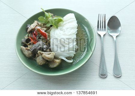 Curry chicken noodles (KHANOM CHIN) with vegetableThis is local Thai foods in Vermicelli rice.