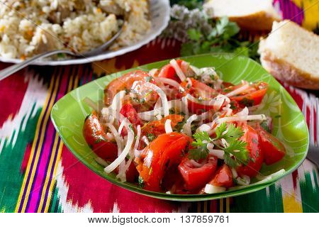 Fresh Salad With Tomatoes, Onions And Coriander - Achik-chuchuk. The Traditional Dish Of Uzbek Cuisi