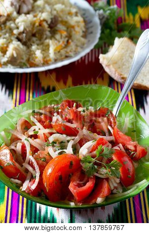Fresh Salad With Tomatoes, Onions And Coriander - Achik-chuchuk. The Traditional Dish Of Uzbek Cuisi