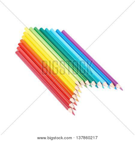 Multiple colorful color pencils composition arranged in a line to form a rainbow gradient, composition isolated over the white background