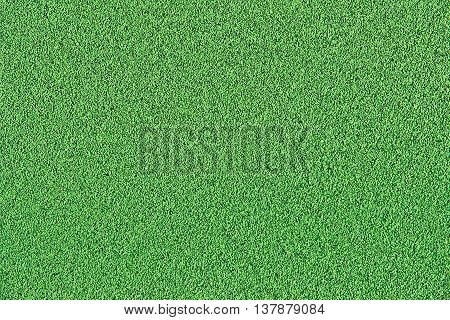 Texture of green rubber floor surface on playground