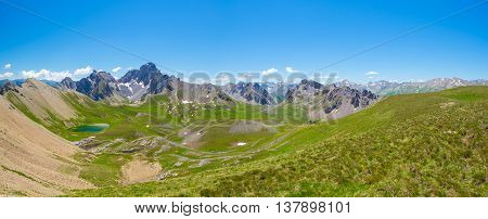 High Altitude Blue Lake In Idyllic Uncontaminated Environment Once Covered By Glaciers. Summer Adven