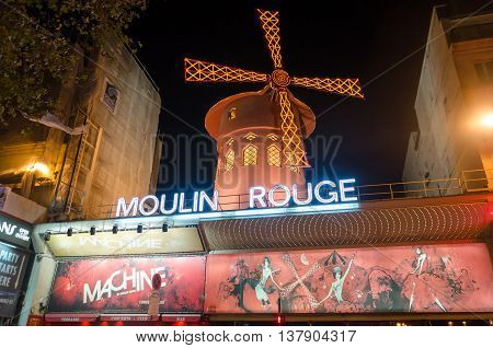 PARIS FRANCE - NOVEMBER 14 2013: The famous cabaret Moulin Rouge located close to Montmartre in the district of Pigalle on boulevard Clichy in the 18th arrondissement of Paris.