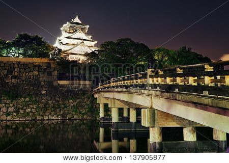 Osaka Castle at night as the famous historical landmark of the city. Japan.