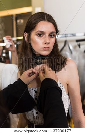MILAN ITALY - JUNE 19: Beautiful model poses in the backstage just before Damir Doma SS 17 show during Milan Men's Fashion Week on JUNE 19 2016 in Milan.