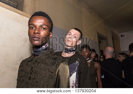 MILAN ITALY - JUNE 19: Beautiful models pose in the backstage just before Damir Doma SS 17 show during Milan Men's Fashion Week on JUNE 19 2016 in Milan.