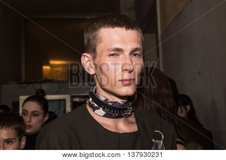 MILAN ITALY - JUNE 19: Beautiful model poses in the backstage just before Damir Doma SS 17 show during Milan Men's Fashion Week on JUNE 19 2016 in Milan.