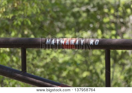 Stenciled sign on gate to access road in Freetown State Forest