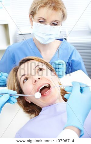 Arzt Zahnarzt und Patienten Frau