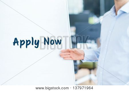 Apply now concept. Businessman (recruiter HR staffer) attract new employees on company presentation.