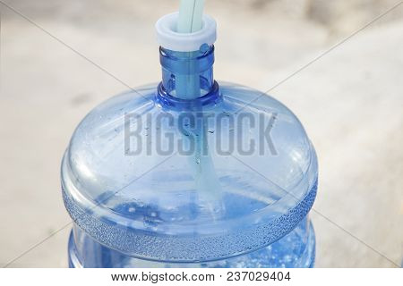 Water Gallon Refill Vending Station Pump (gallon) For Water With A Hose Inside At The Time Of Fillin